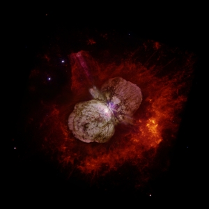 Eta Carinae's great eruption in the 1840s created the billowing Homunculus Nebula, imaged here by Hubble, and transformed the binary into a unique object in our galaxy. Astronomers cannot yet explain what caused this eruption. The discovery of likely Eta Carinae twins in other galaxies will help scientists better understand this brief phase in the life of a massive star. Credits: NASA, ESA, and the Hubble SM4 ERO Team