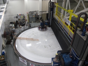 The first GMT primary mirror segment on the polishing machine at the Steward Observatory Mirror Lab. Credit: GMTO Corporation