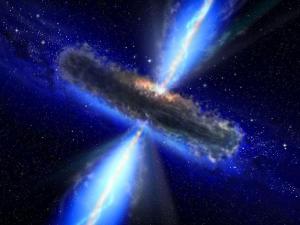 This artist's concept illustrates a quasar, or feeding black hole, similar to APM 08279+5255, where astronomers discovered huge amounts of water vapor. Gas and dust likely form a torus around the central black hole, with clouds of charged gas above and below. X-rays emerge from the very central region, while thermal infrared radiation is emitted by dust throughout most of the torus. While this figure shows the quasar's torus approximately edge-on, the torus around APM 08279+5255 is likely positioned face-on from our point of view. Image credit: NASA/ESA