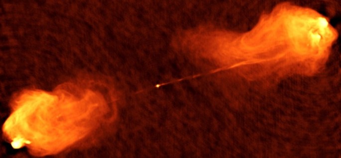 In this radio image, two jets shoot out of the center of active galaxy Cygnus A. GLAST may solve the mystery of how these jets are produced and what they are made of. Credit: NRAO 